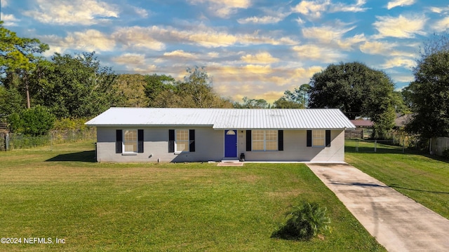 single story home with a front yard and a porch