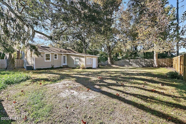 view of yard featuring central AC