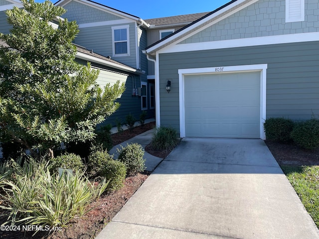 exterior space featuring a garage