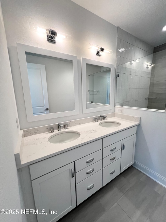 88 Latham Dr, Ponte Vedra, FL 32081 - full bathroom featuring double vanity, tiled shower, and baseboards