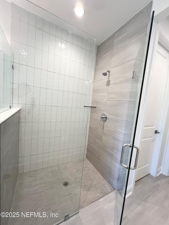88 Latham Dr, Ponte Vedra, FL 32081 - full bath featuring a stall shower, tile patterned floors, and recessed lighting