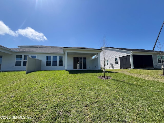 88 Latham Dr, Ponte Vedra, FL 32081 - rear view of house with a lawn