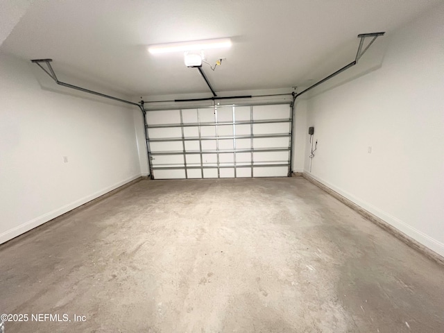 88 Latham Dr, Ponte Vedra, FL 32081 - garage with baseboards and a garage door opener