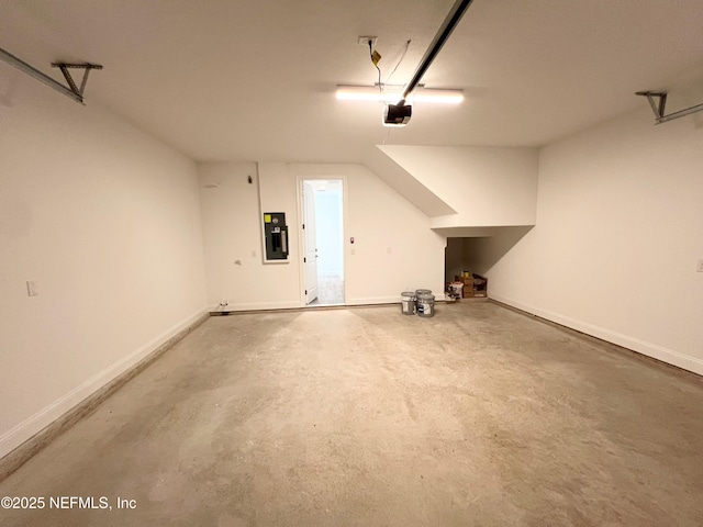88 Latham Dr, Ponte Vedra, FL 32081 - garage featuring a garage door opener, electric panel, and baseboards