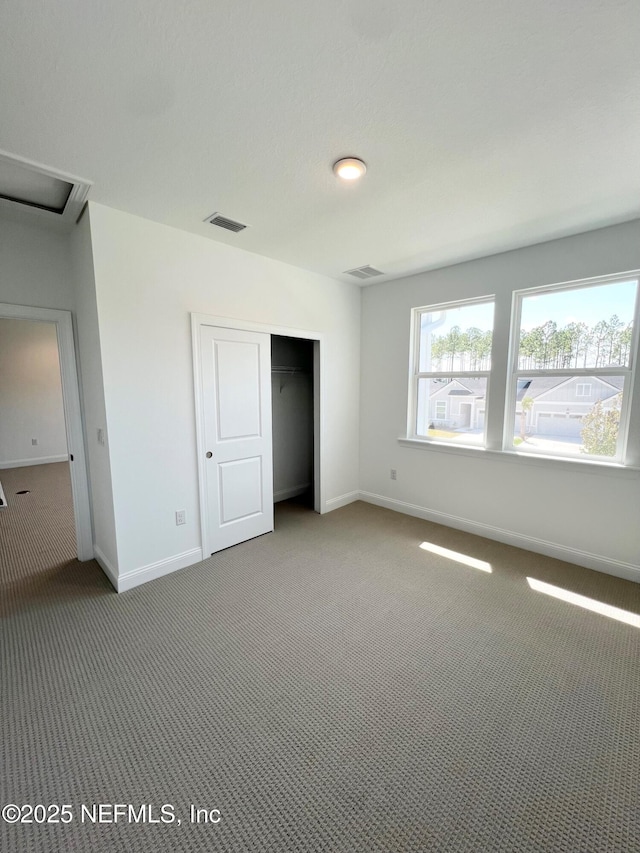 88 Latham Dr, Ponte Vedra, FL 32081 - unfurnished bedroom with carpet floors, baseboards, and a closet