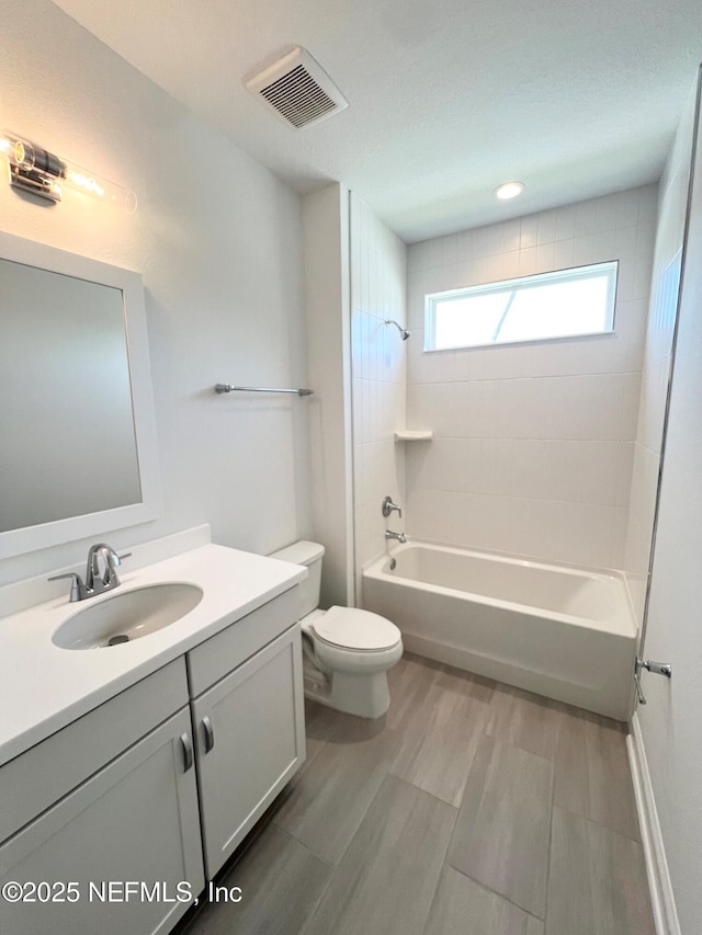 88 Latham Dr, Ponte Vedra, FL 32081 - bathroom with toilet, vanity, shower / bath combination, and wood finished floors