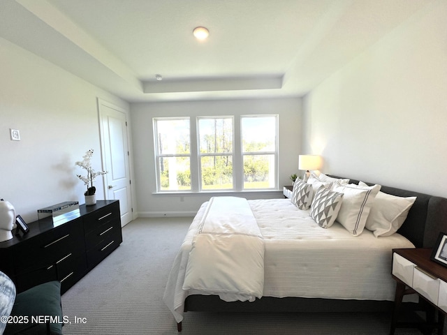 88 Latham Dr, Ponte Vedra, FL 32081 - bedroom with light carpet, a raised ceiling, and baseboards