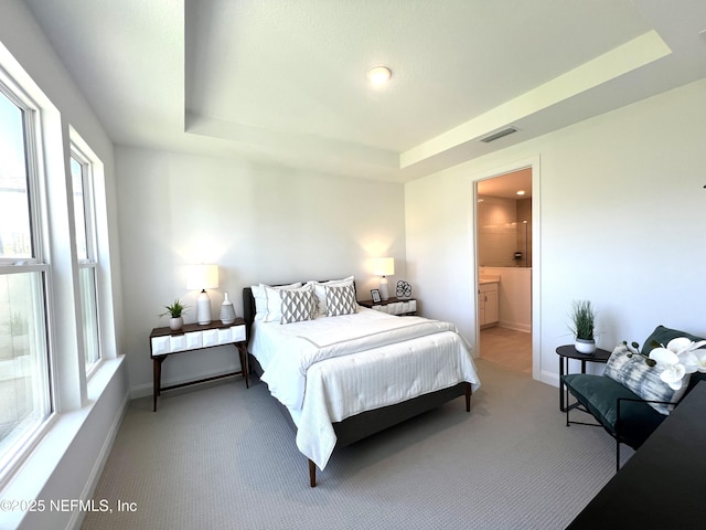 88 Latham Dr, Ponte Vedra, FL 32081 - bedroom with light carpet, a raised ceiling, baseboards, and multiple windows