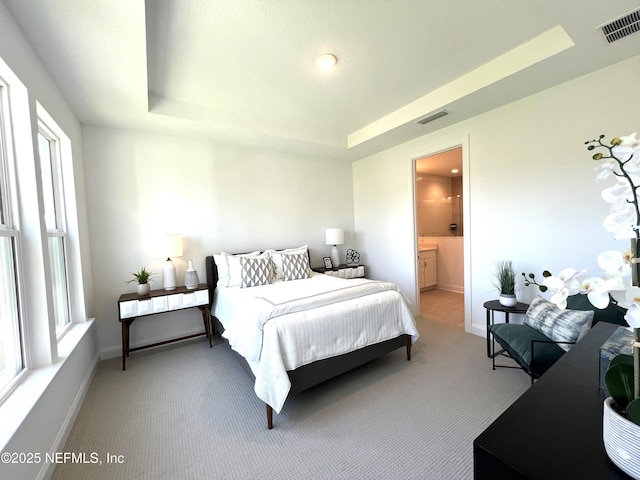 88 Latham Dr, Ponte Vedra, FL 32081 - bedroom with a raised ceiling, carpet flooring, multiple windows, and baseboards
