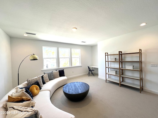 88 Latham Dr, Ponte Vedra, FL 32081 - living area featuring light colored carpet, baseboards, a textured ceiling, and recessed lighting