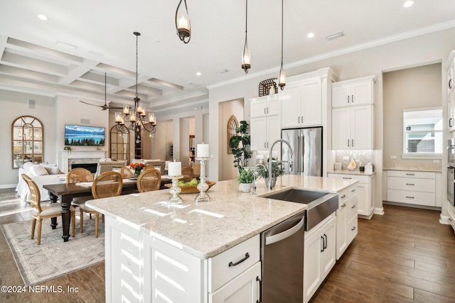 kitchen featuring dark hardwood / wood-style flooring, coffered ceiling, stainless steel appliances, a kitchen island with sink, and sink