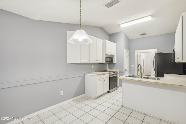 kitchen with white cabinetry, sink, stainless steel appliances, pendant lighting, and lofted ceiling