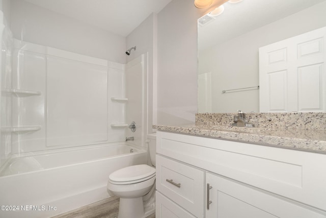 full bathroom featuring shower / bath combination, vanity, wood-type flooring, and toilet