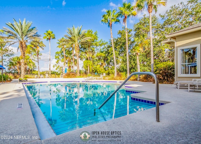 view of pool with a patio area