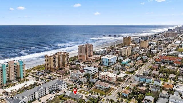 bird's eye view featuring a beach view and a water view