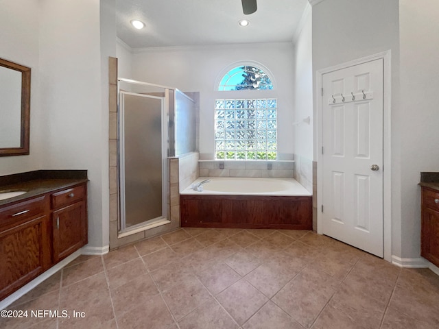 bathroom featuring vanity, independent shower and bath, and ornamental molding