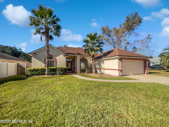 9767 Brockham Ct, Jacksonville, FL 32221 - view of front of house featuring stucco siding, a garage, and concrete driveway