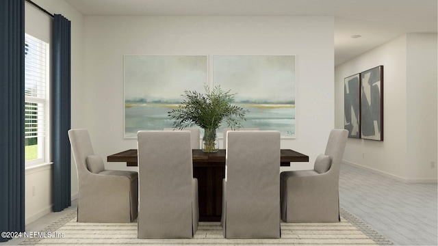 dining room with light hardwood / wood-style floors