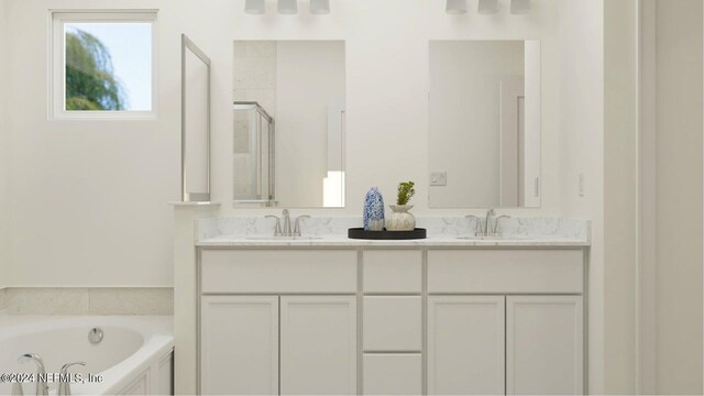 bathroom featuring vanity and plus walk in shower