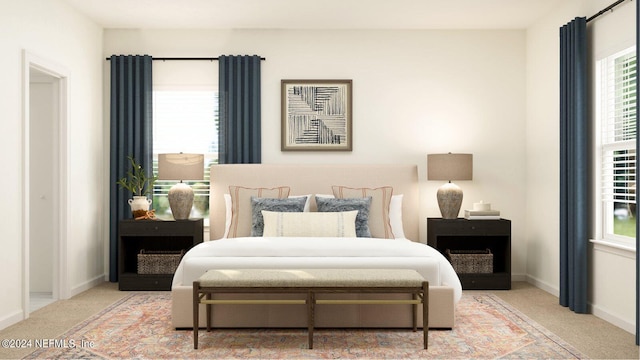 bedroom featuring multiple windows and carpet floors