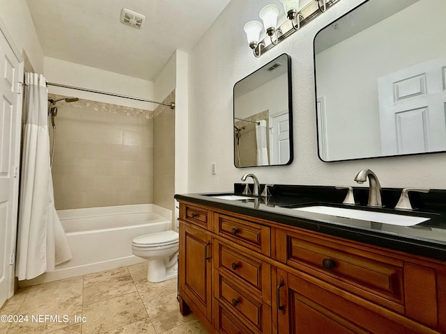 full bathroom with shower / bath combination with curtain, vanity, and toilet