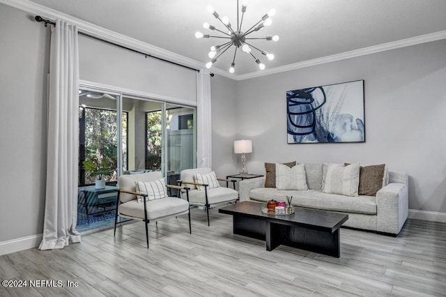 living room featuring a chandelier, ornamental molding, and light hardwood / wood-style flooring