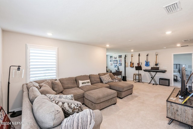 living room featuring light carpet