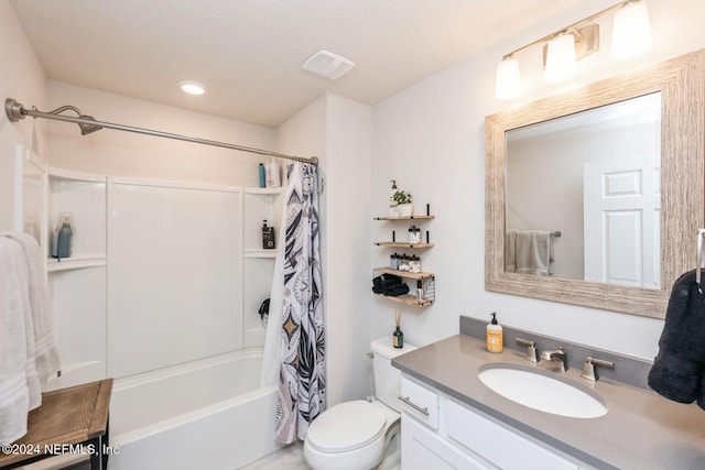 full bathroom with vanity, toilet, and shower / bath combo with shower curtain