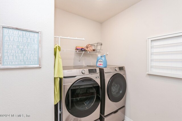 laundry area featuring independent washer and dryer