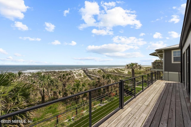 1304 Strand St, Neptune Beach, FL 32266 - wooden terrace featuring a water view