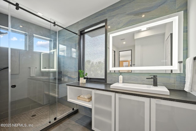1304 Strand St, Neptune Beach, FL 32266 - full bath featuring vanity, a stall shower, and tile patterned flooring