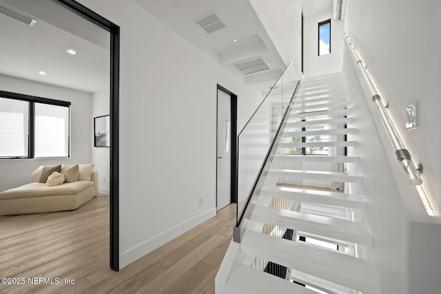 1304 Strand St, Neptune Beach, FL 32266 - stairway with wood finished floors, baseboards, and recessed lighting