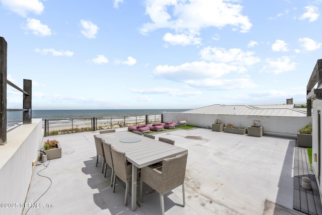 1304 Strand St, Neptune Beach, FL 32266 - view of patio / terrace featuring view of water and beach and outdoor dining space