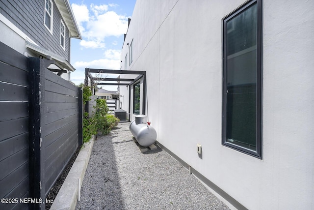 1304 Strand St, Neptune Beach, FL 32266 - view of property exterior with stucco siding and cooling unit