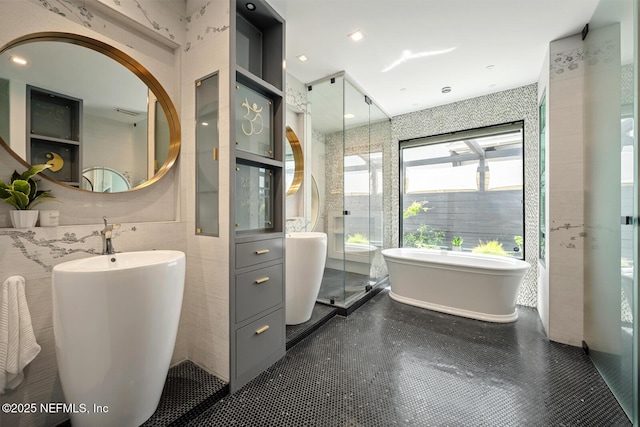 1304 Strand St, Neptune Beach, FL 32266 - full bath with tile walls, a freestanding tub, and a shower stall