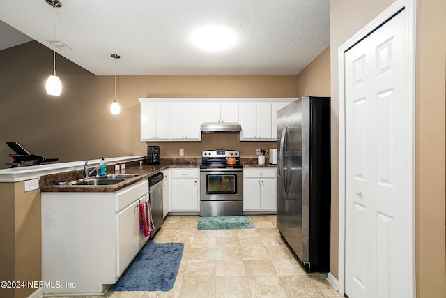 kitchen with kitchen peninsula, decorative light fixtures, stainless steel appliances, and white cabinets