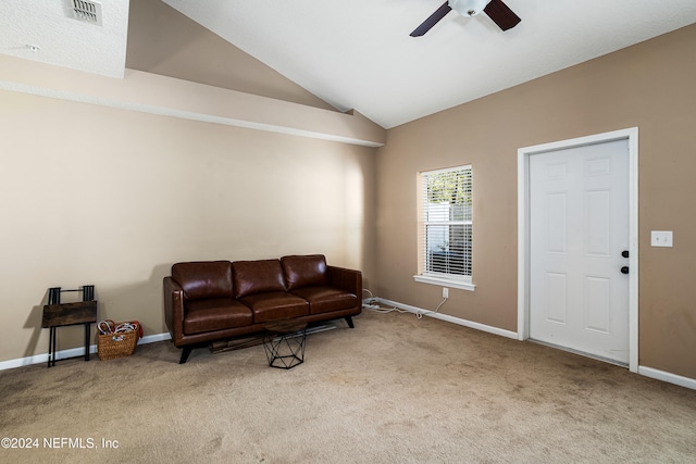 sitting room with light carpet, ceiling fan, and lofted ceiling