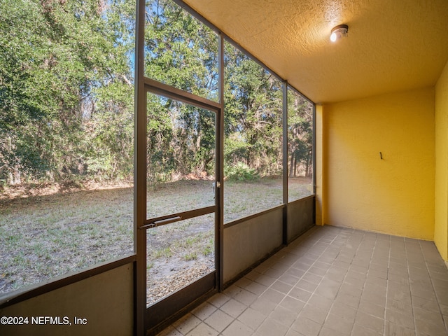 unfurnished sunroom with a healthy amount of sunlight