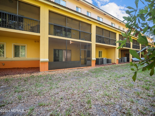 view of building exterior with cooling unit