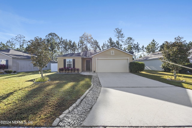 ranch-style home with a garage and a front lawn