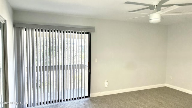 empty room with carpet flooring and ceiling fan