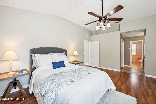 bedroom with ceiling fan, lofted ceiling, and dark wood-type flooring