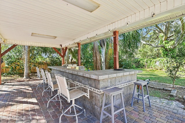 view of patio featuring a bar