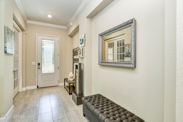 doorway featuring ornamental molding