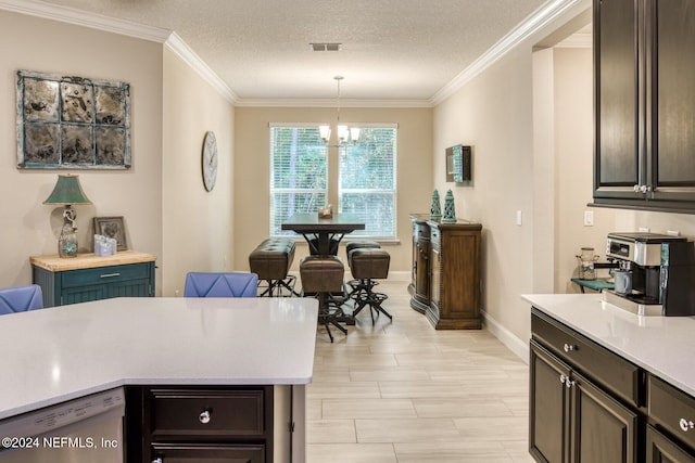 kitchen featuring dishwasher, an inviting chandelier, pendant lighting, a textured ceiling, and ornamental molding