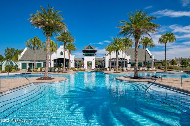 view of swimming pool featuring a patio