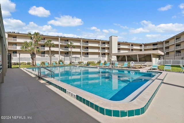 view of pool featuring a patio area