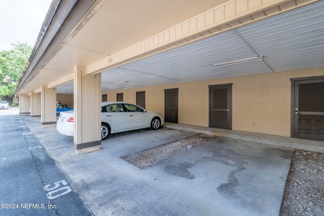 view of parking with a carport