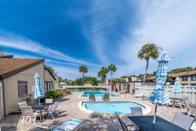 view of pool featuring a patio