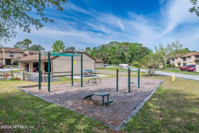 view of jungle gym with a lawn